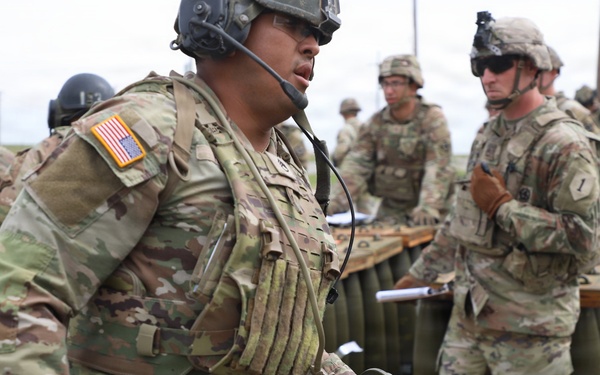 Best Redleg Competitors from 1st Armored Division Artillery load up ammunition in preparation for their evaluated live fire