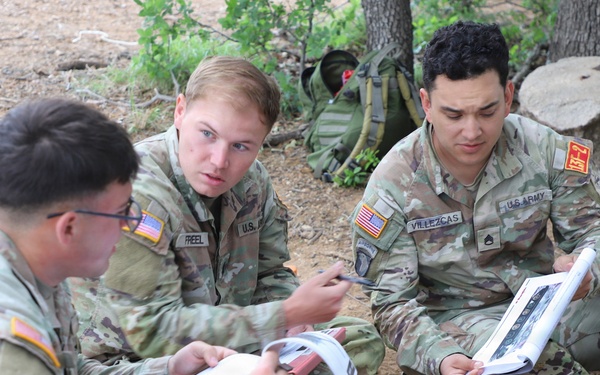 Best Redleg Competitors from 1st Armored Division Artillery complete the foreign vehicle identification lane during the 2026 Best Redleg Competition