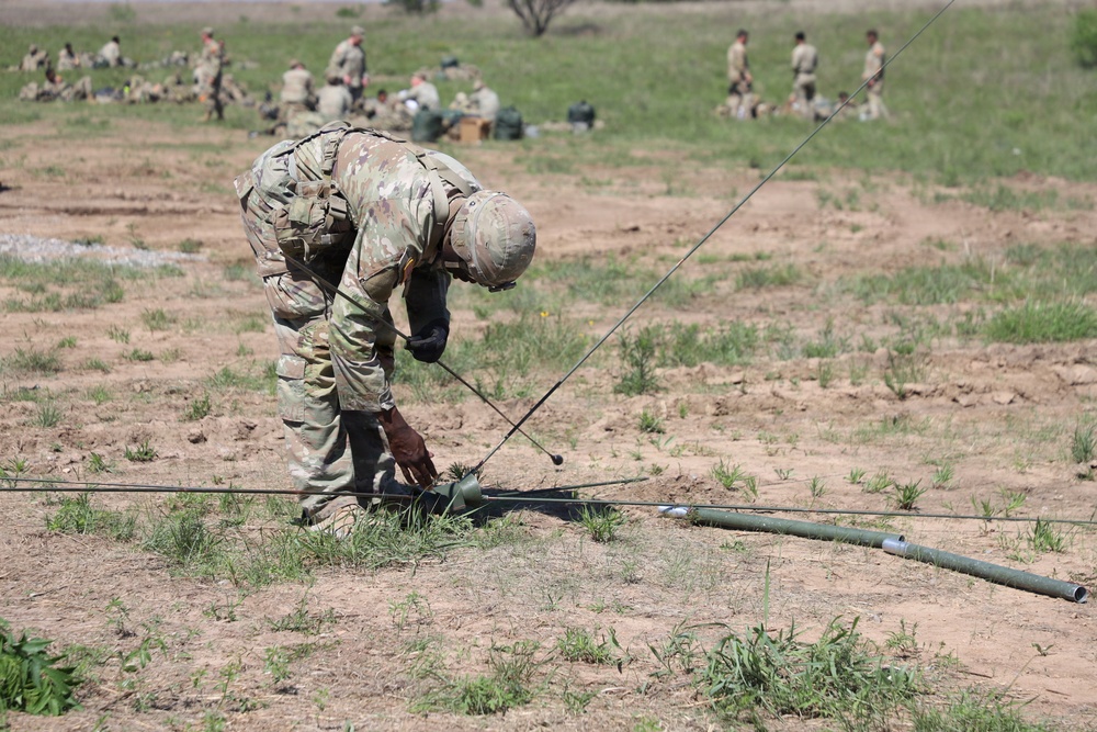 13J Best Redleg Competitors from 1st Armored Division Artillery compete in MOS specific lanes during the 2026 Best Redleg Competition at Fort Sill, Oklahoma
