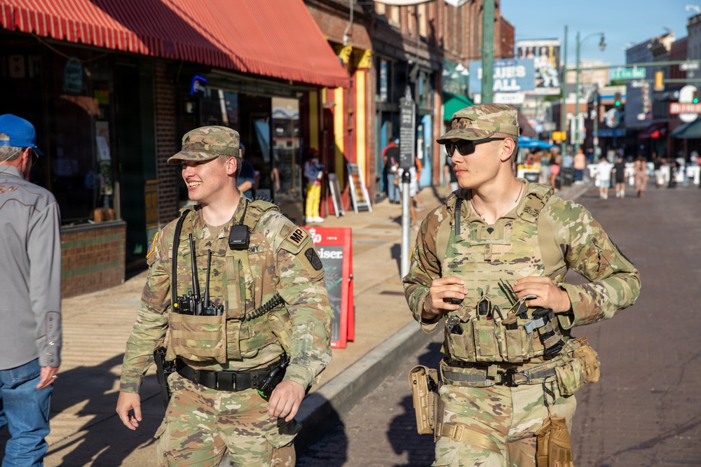 Tennessee National Guard Soldiers assigned to the Memphis Safe Task Force conduct a safety patrol of Beale Street