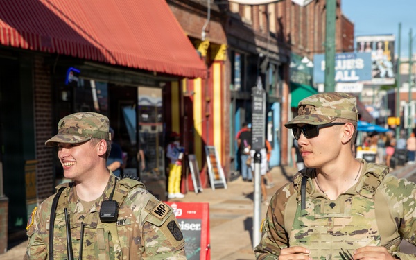 Tennessee National Guard Soldiers assigned to the Memphis Safe Task Force conduct a safety patrol of Beale Street