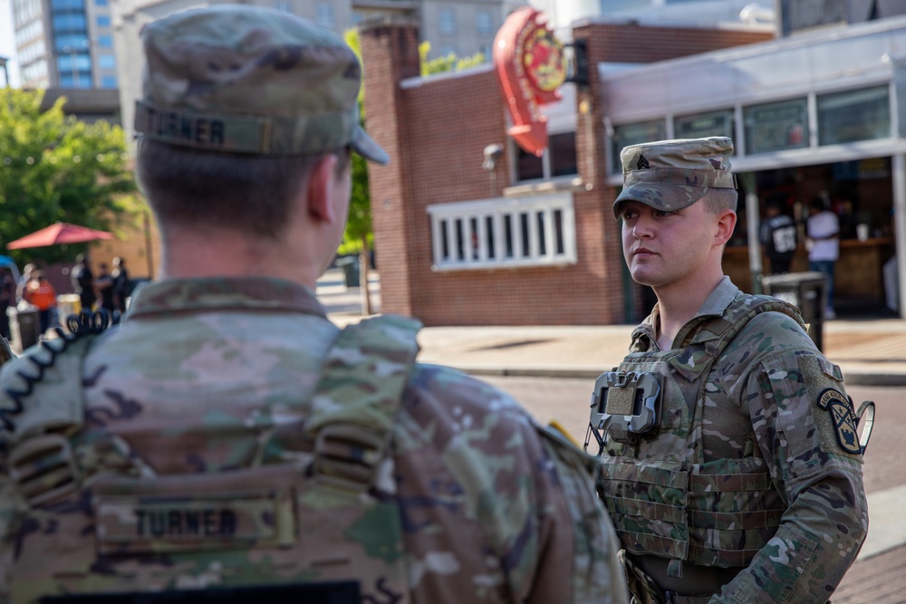 Tennessee National Guard Soldiers assigned to the Memphis Safe Task Force conduct a safety patrol of Beale Street