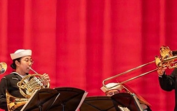 U.S. SEVENTH Fleet Band's Shonan Brass Quintet performs for the USS George Washington Change of Command Ceremony