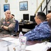 Rear Adm. Eric Anduze, CGS-5/CTF-70 Commander, meets with JMSDF Vice Adm. GOKA Yoshihiro and other JMSDF members during Flag Talks 26-2 at Commander Fleet Activities Yokosuka, Japan