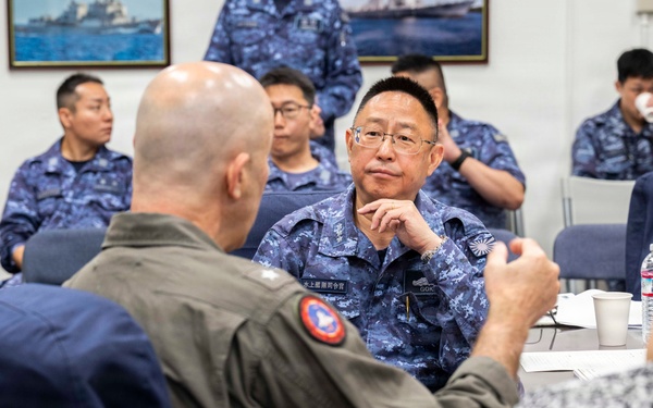 Rear Adm. Eric Anduze, CGS-5/CTF-70 Commander, meets with JMSDF Vice Adm. GOKA Yoshihiro and other JMSDF members during Flag Talks 26-2 at Commander Fleet Activities Yokosuka, Japan