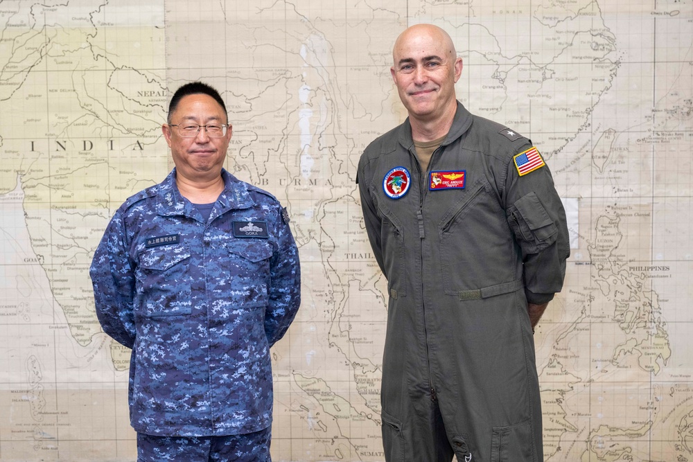 Rear Adm. Eric Anduze, CGS-5/CTF-70 Commander, meets with JMSDF Vice Adm. GOKA Yoshihiro and other JMSDF members during Flag Talks 26-2 at Commander Fleet Activities Yokosuka, Japan