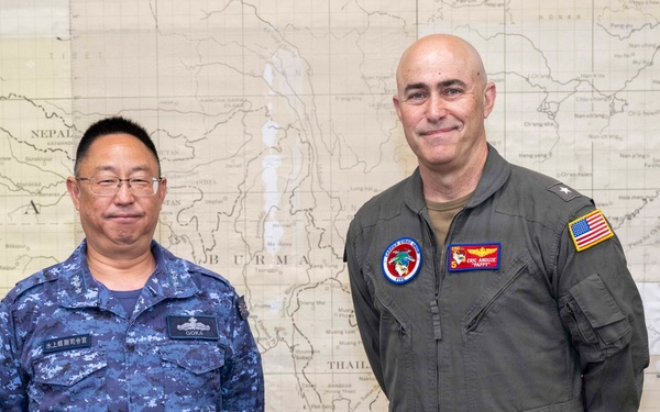 Rear Adm. Eric Anduze, CGS-5/CTF-70 Commander, meets with JMSDF Vice Adm. GOKA Yoshihiro and other JMSDF members during Flag Talks 26-2 at Commander Fleet Activities Yokosuka, Japan