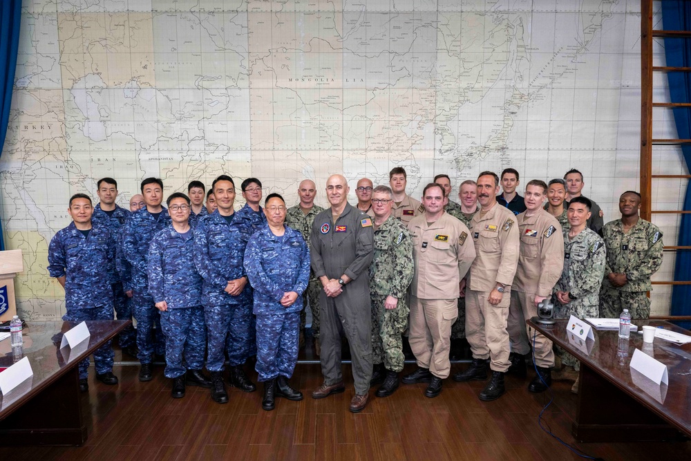 Rear Adm. Eric Anduze, CGS-5/CTF-70 Commander, meets with JMSDF Vice Adm. GOKA Yoshihiro and other JMSDF members during Flag Talks 26-2 at Commander Fleet Activities Yokosuka, Japan