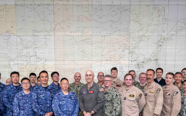 Rear Adm. Eric Anduze, CGS-5/CTF-70 Commander, meets with JMSDF Vice Adm. GOKA Yoshihiro and other JMSDF members during Flag Talks 26-2 at Commander Fleet Activities Yokosuka, Japan