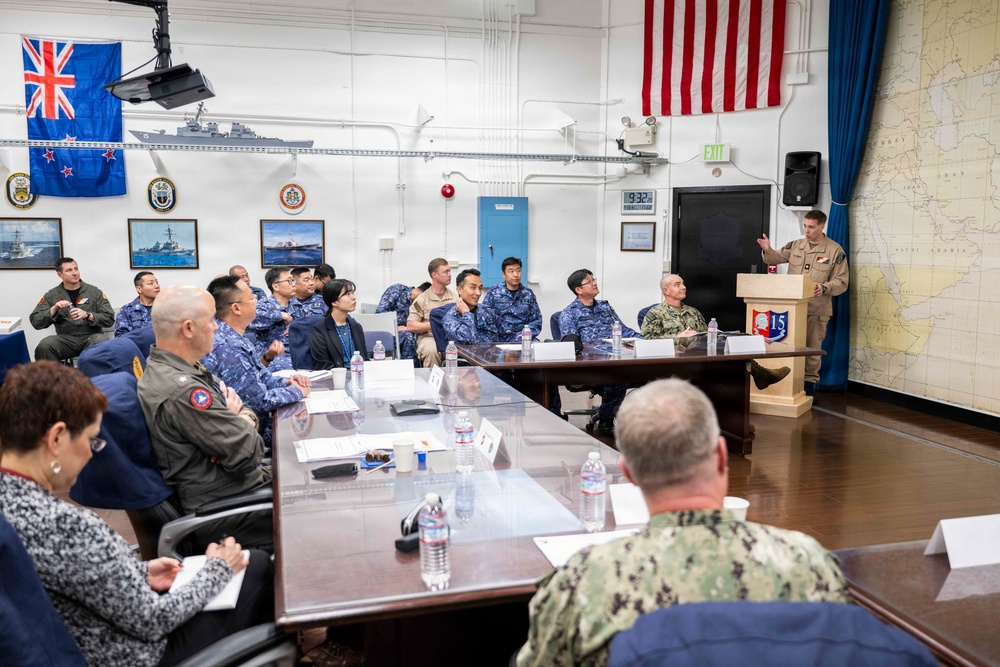 Rear Adm. Eric Anduze, CGS-5/CTF-70 Commander, meets with JMSDF Vice Adm. GOKA Yoshihiro and other JMSDF members during Flag Talks 26-2 at Commander Fleet Activities Yokosuka, Japan