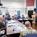 Rear Adm. Eric Anduze, CGS-5/CTF-70 Commander, meets with JMSDF Vice Adm. GOKA Yoshihiro and other JMSDF members during Flag Talks 26-2 at Commander Fleet Activities Yokosuka, Japan