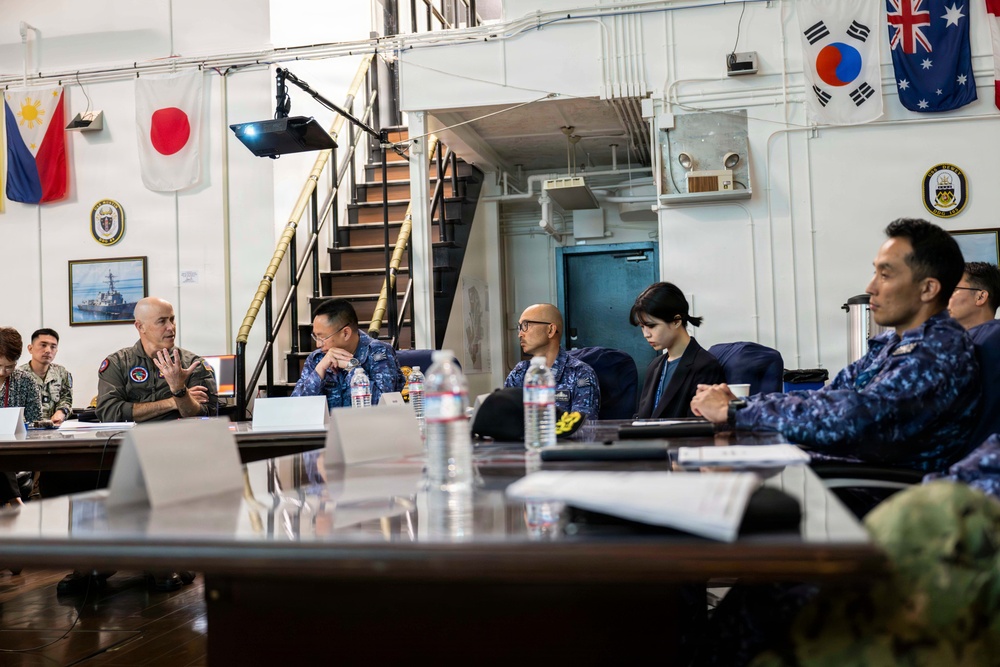 Rear Adm. Eric Anduze, CGS-5/CTF-70 Commander, meets with JMSDF Vice Adm. GOKA Yoshihiro and other JMSDF members during Flag Talks 26-2 at Commander Fleet Activities Yokosuka, Japan