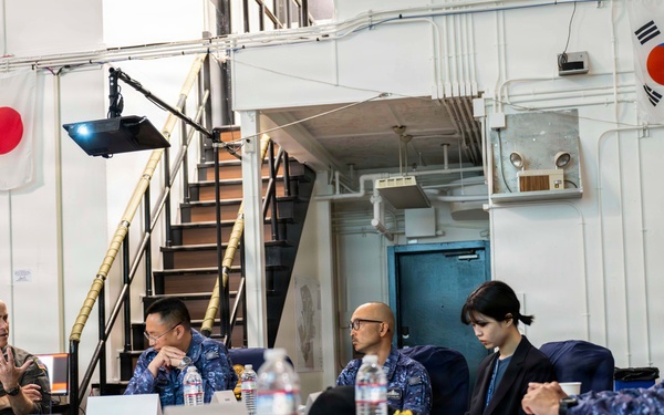 Rear Adm. Eric Anduze, CGS-5/CTF-70 Commander, meets with JMSDF Vice Adm. GOKA Yoshihiro and other JMSDF members during Flag Talks 26-2 at Commander Fleet Activities Yokosuka, Japan