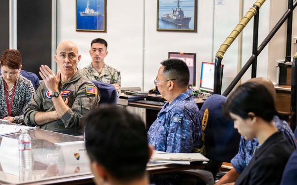Rear Adm. Eric Anduze, CGS-5/CTF-70 Commander, meets with JMSDF Vice Adm. GOKA Yoshihiro and other JMSDF members during Flag Talks 26-2 at Commander Fleet Activities Yokosuka, Japan