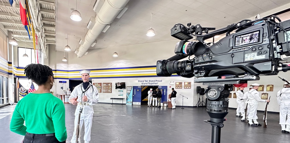 A Member of the  U.S. Navy Ceremonial Guard Drill Team Speaks  to WJZ-TV