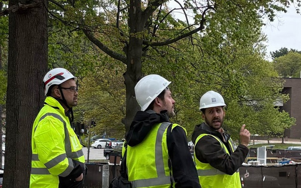Construction officials conduct site walkthrough