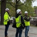 Construction officials conduct site walkthrough