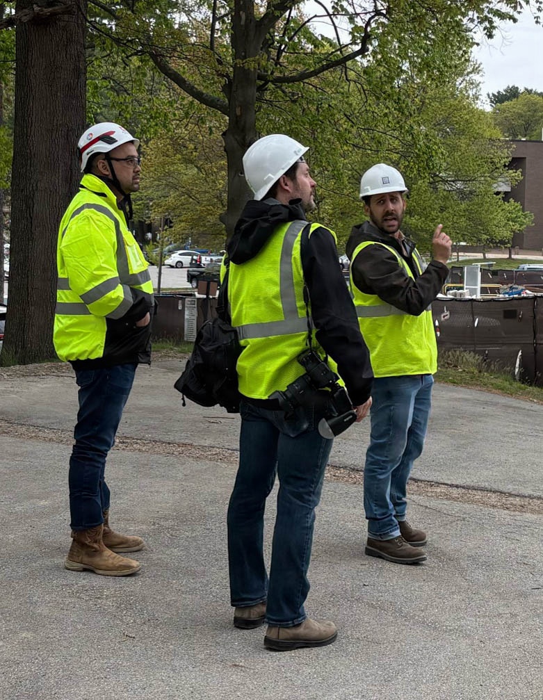 Construction officials conduct site walkthrough