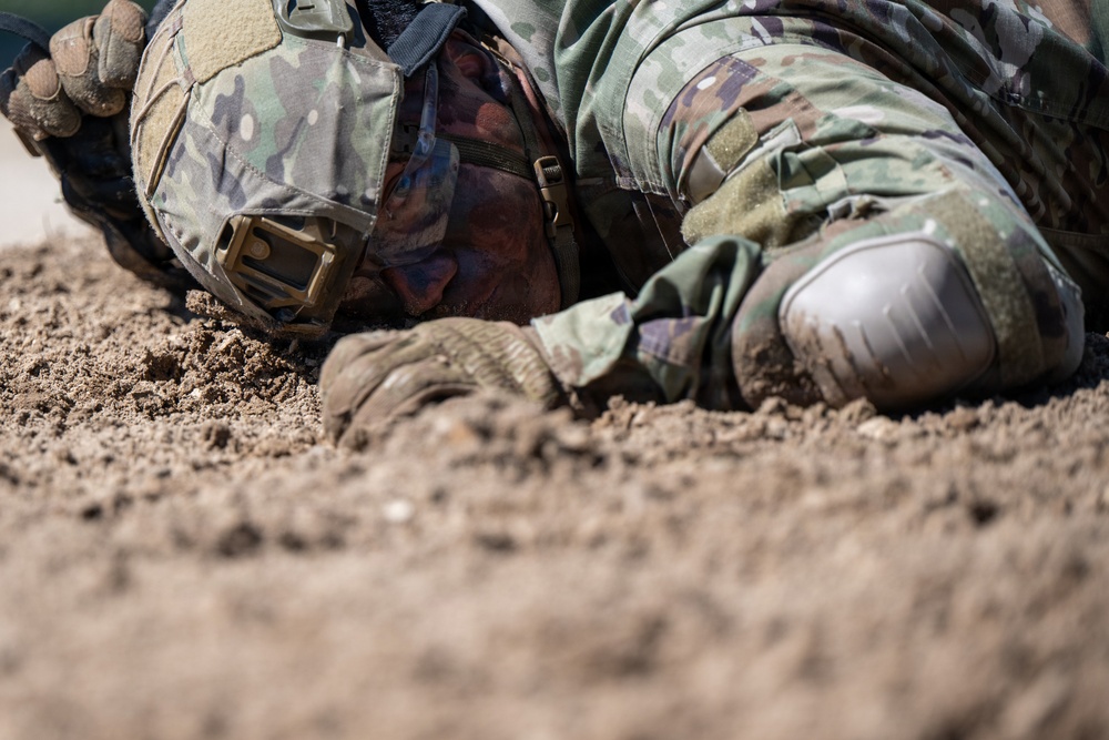 Defenders train over obstacles