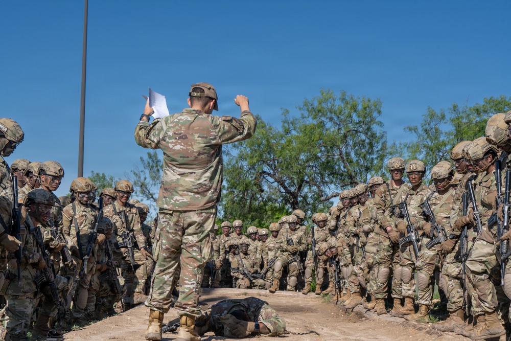Defenders train over obstacles