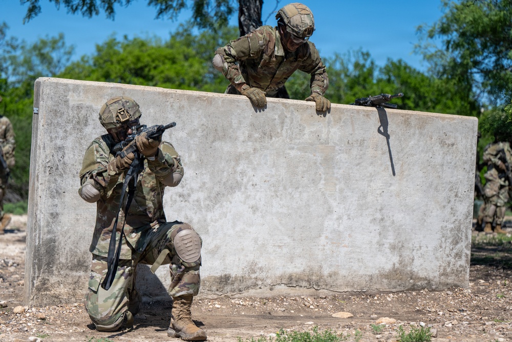 Defenders train over obstacles