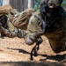 Defenders train over obstacles
