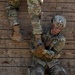 Defenders train over obstacles
