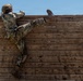 Defenders train over obstacles
