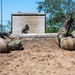 Defenders train over obstacles