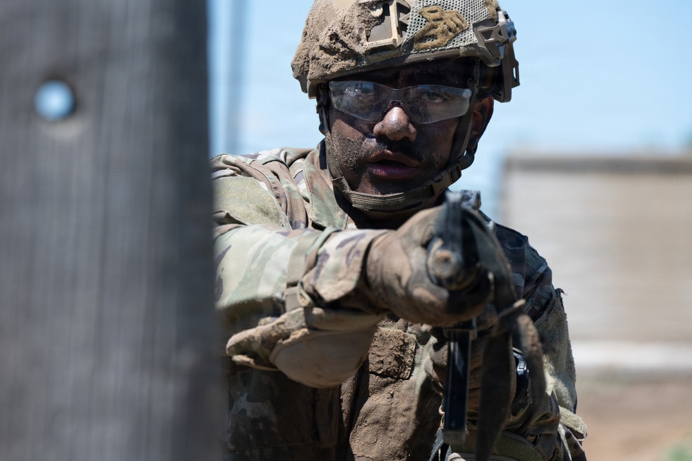 Defenders train over obstacles
