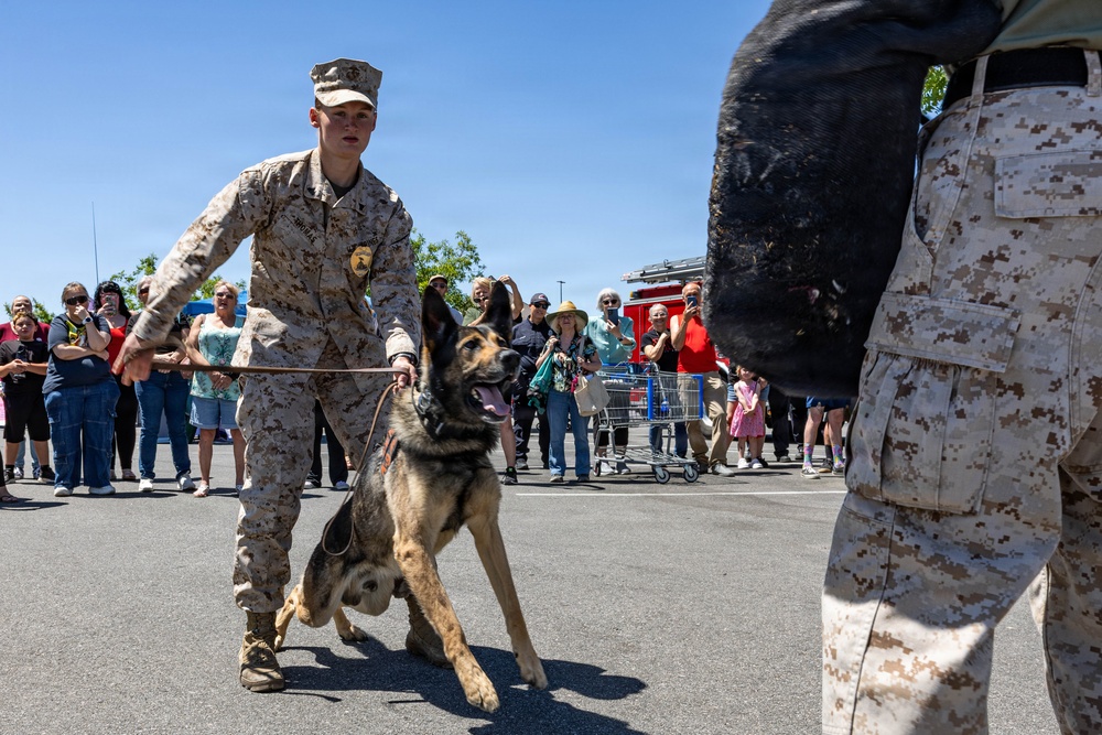 USMC K9 handlers give a demo at the Help Yourself, Help Your Neighbor event