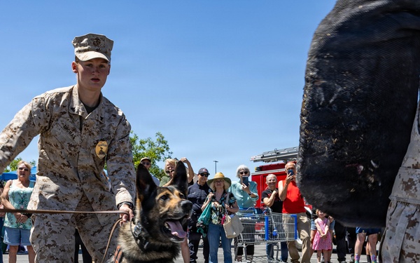 USMC K9 handlers give a demo at the Help Yourself, Help Your Neighbor event