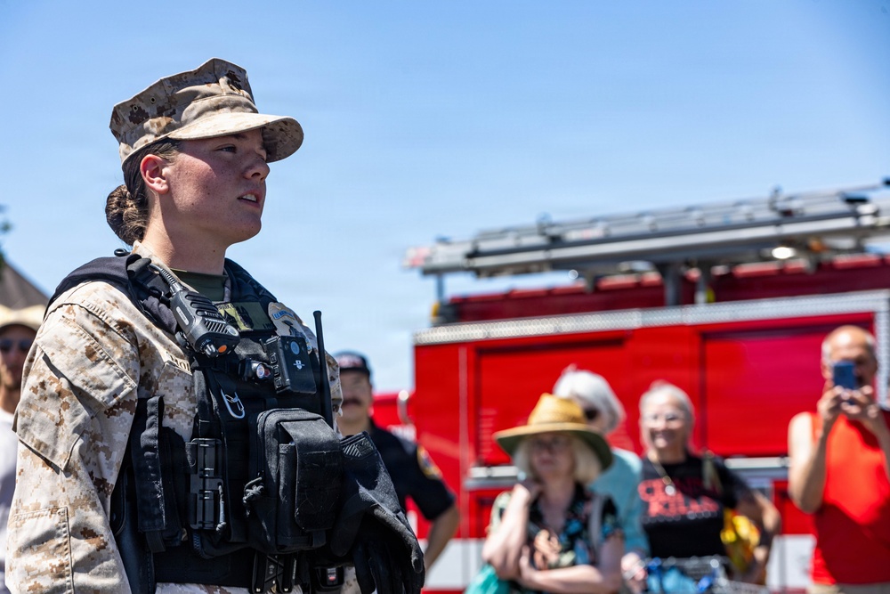 USMC K9 handlers give a demo at the Help Yourself, Help Your Neighbor event