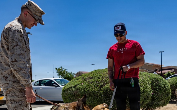 USMC K9 handlers give a demo at the Help Yourself, Help Your Neighbor event