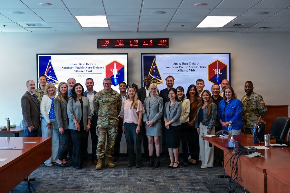 Space Base Delta 3 and regional civic and aerospace leaders pose for a group photo during a visit at Los Angeles Air Force Base