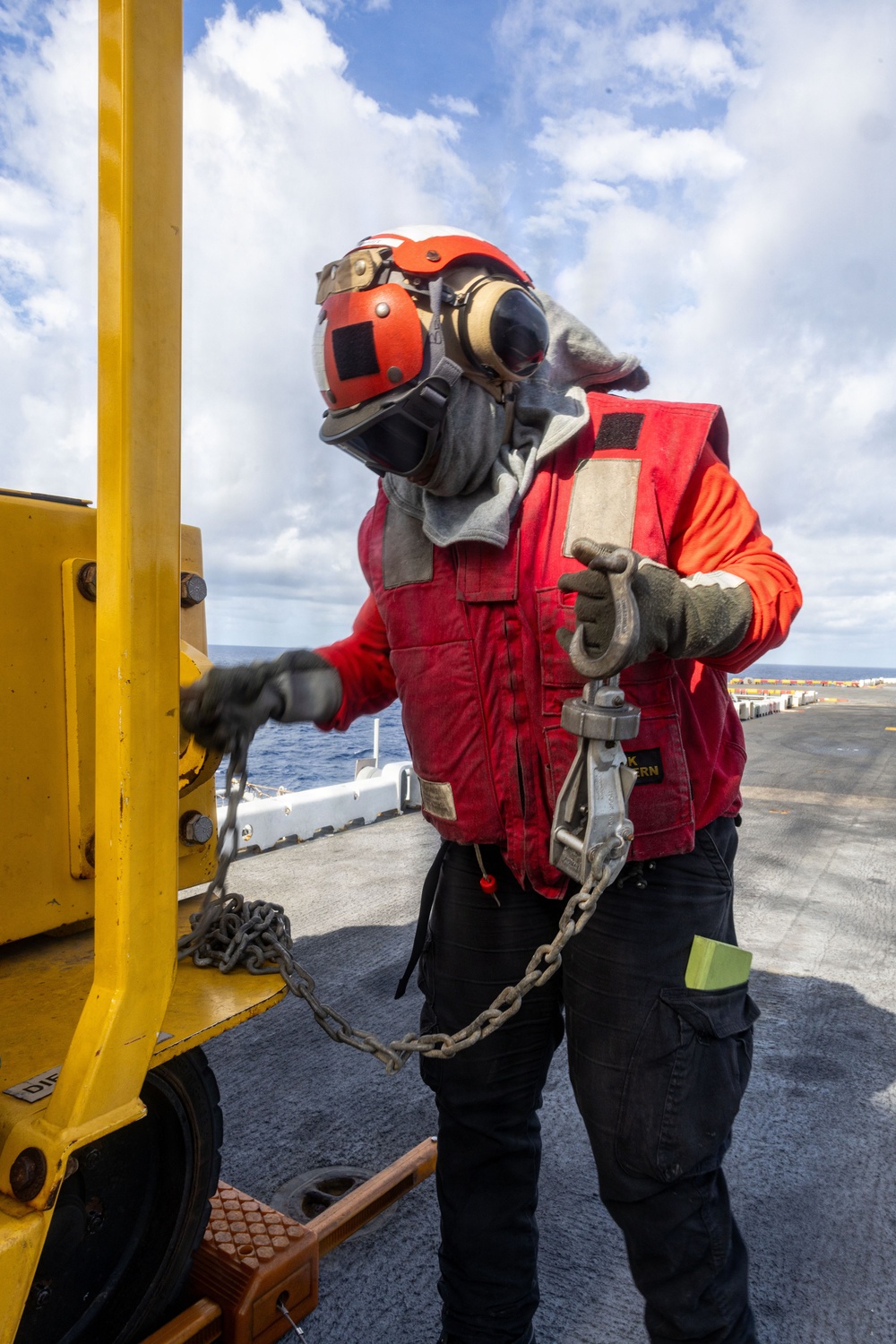 USS Iwo Jima Sailors Chain Down Equipment