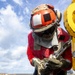 USS Iwo Jima Sailors Chain Down Equipment