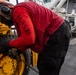 USS Iwo Jima Sailors Chain Down Equipment