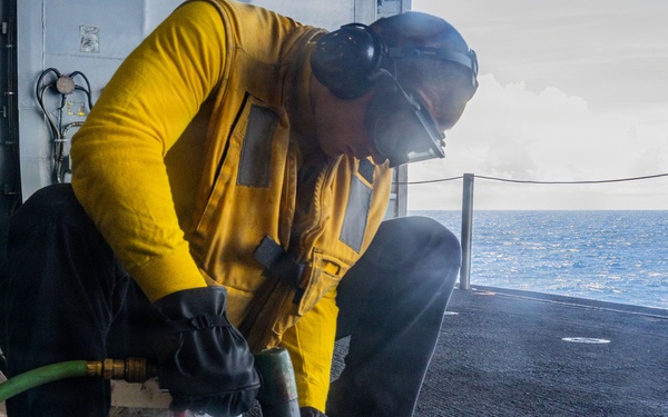 USS Iwo Jima Sailor Preserves Hangar Bay