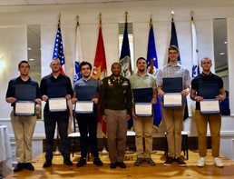 Future Soldiers pose following oath of enlistment