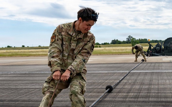 "Mission ready: 60th CES partners with Navy to test mobile aircraft arresting system”