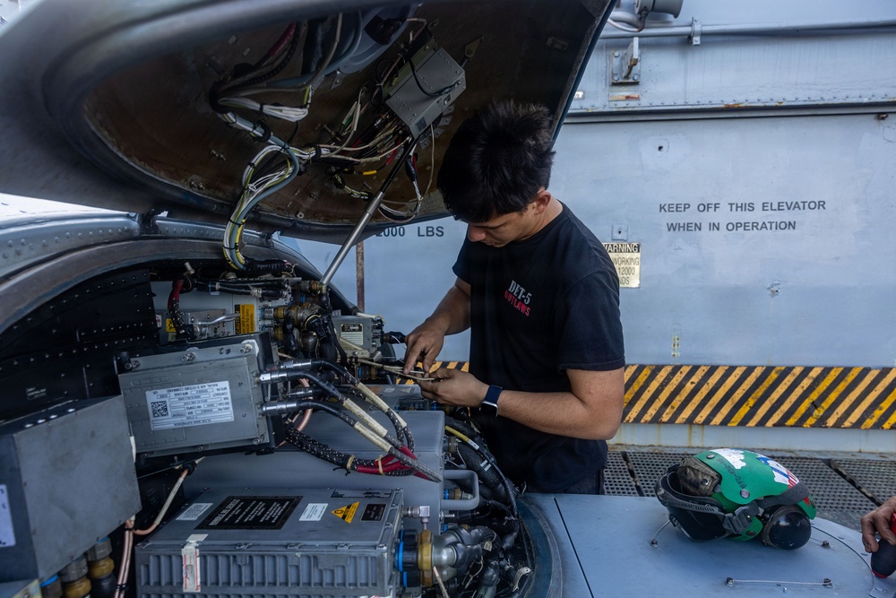 USS Iwo Jima Sailors Conduct Aircraft Maintenance