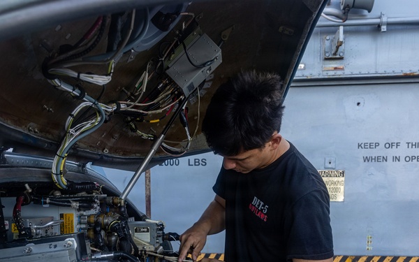 USS Iwo Jima Sailors Conduct Aircraft Maintenance
