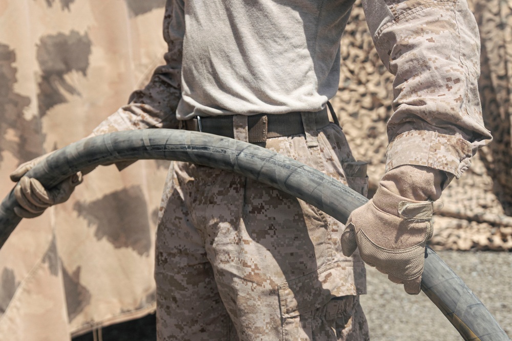 U.S. Marines and Sailors conduct joint refueling operations alongside Army Reserve Soldiers