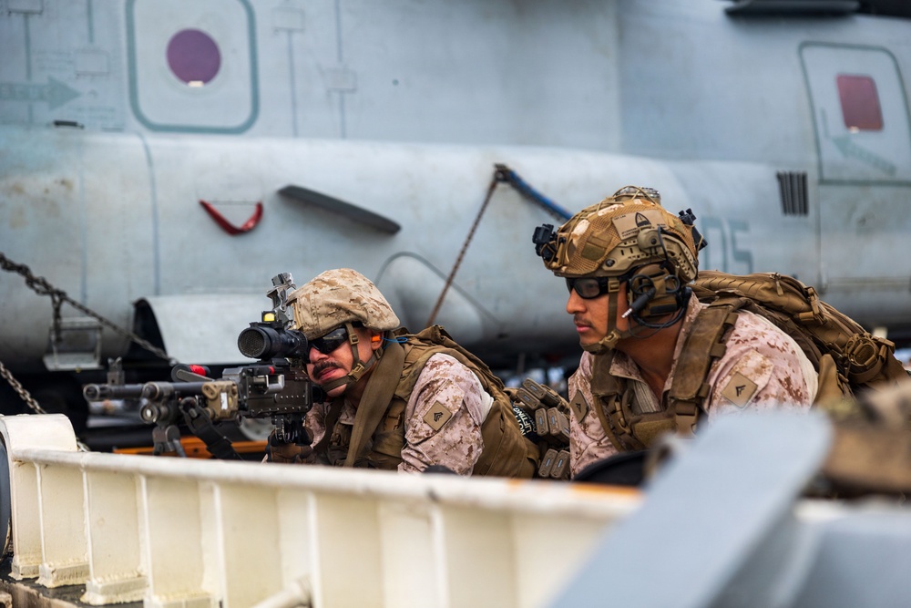 11th MEU Marines, Sailors Conduct A Small Craft Action Team Drill Aboard USS Boxer
