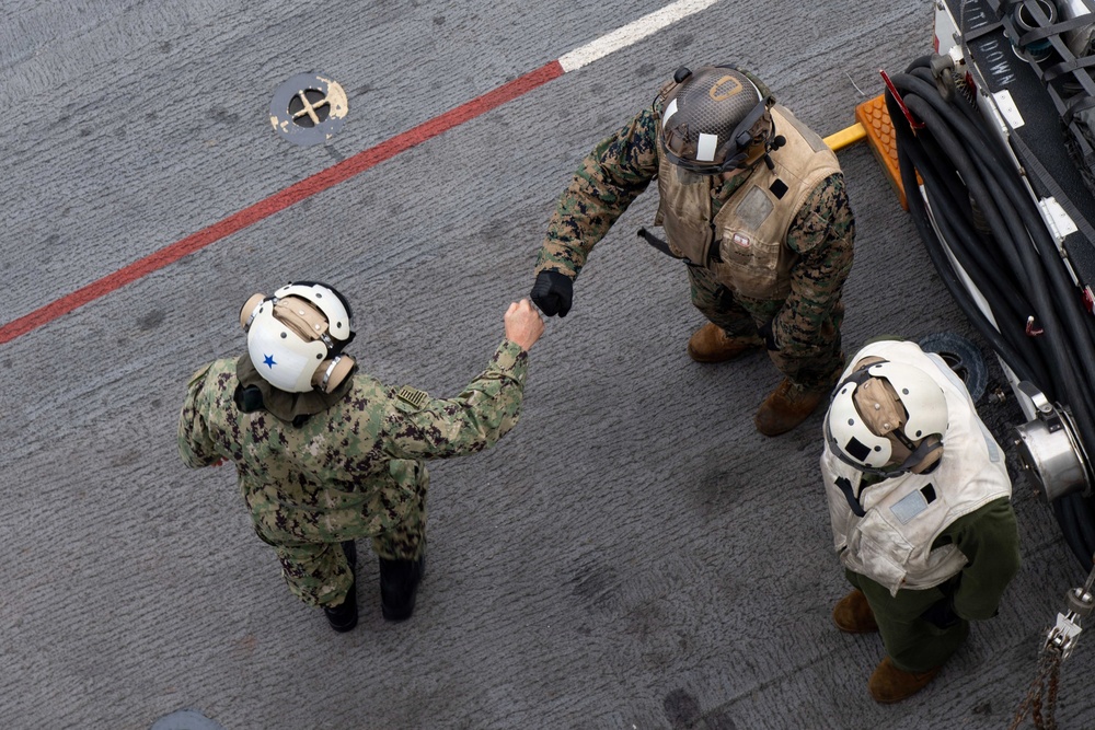 Rear Adm. Tom Shultz, commander, Task Force 76, visits USS Boxer