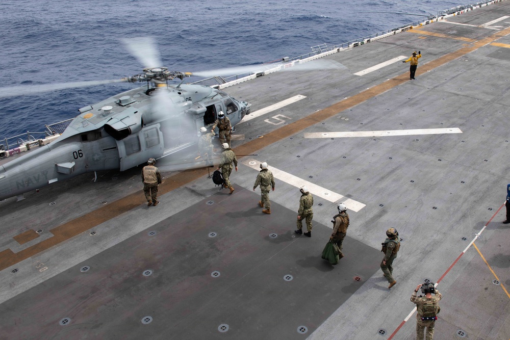 Rear Adm. Tom Shultz, commander, Task Force 76, visits USS Boxer