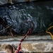 U.S. Navy Divers Conduct Maintenance on USS Iwo Jima (LHD 7)