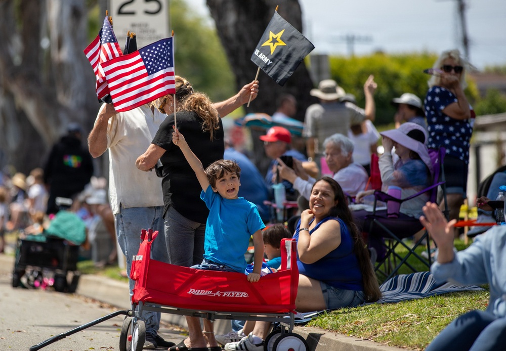 Child holds up American flag at TAFDA 2026