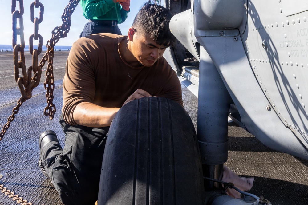 USS Iwo Jima Sailors Conduct Aircraft Maintenance